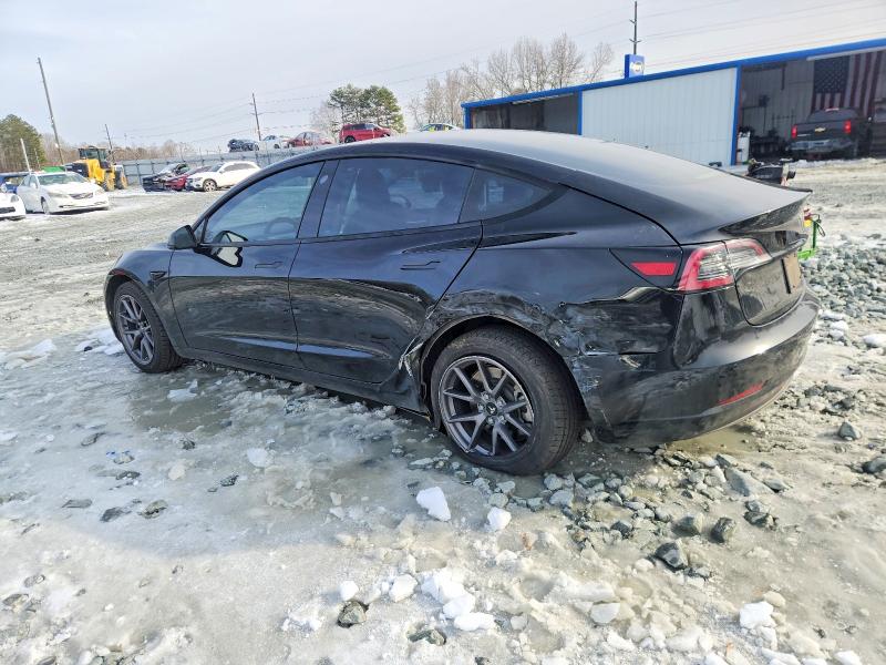 Photo 2 from auction – 2021 TESLA MODEL 3 with VIN 5YJ3E1EA2MF047009