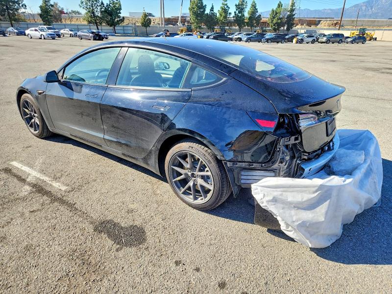 Photo 2 from auction – 2022 TESLA MODEL 3 with VIN 5YJ3E1EB9NF195541