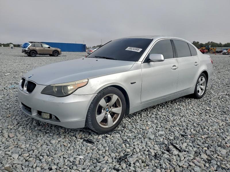 BMW 525 I 2006 with VIN WBANE53586CK84669 - Photo from auction