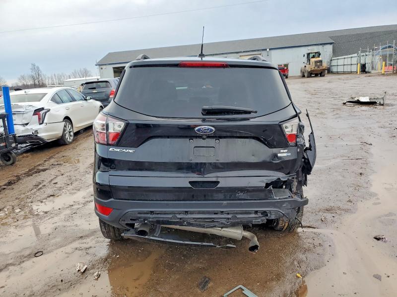 Photo 6 from auction – 2017 FORD ESCAPE with VIN 1FMCU9GD4HUE70661