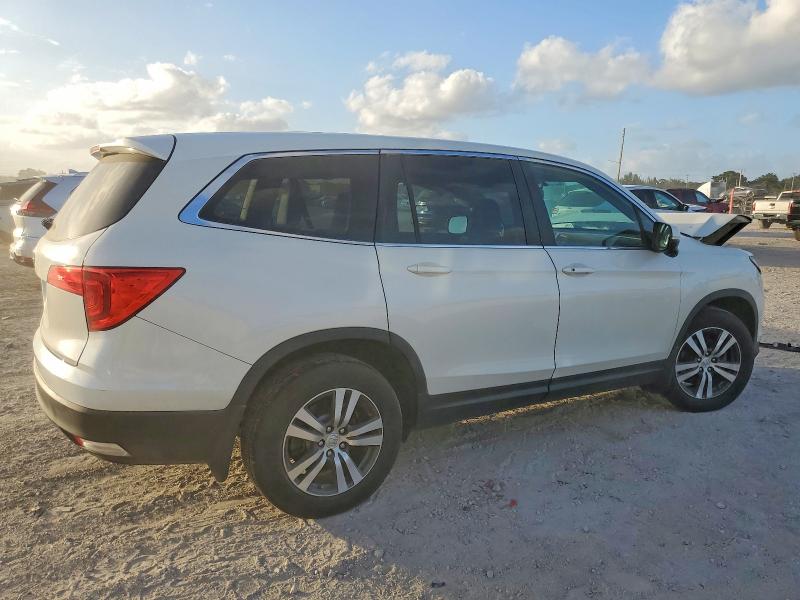 Photo 3 from auction – 2016 HONDA PILOT EXL with VIN 5FNYF5H5XGB018175
