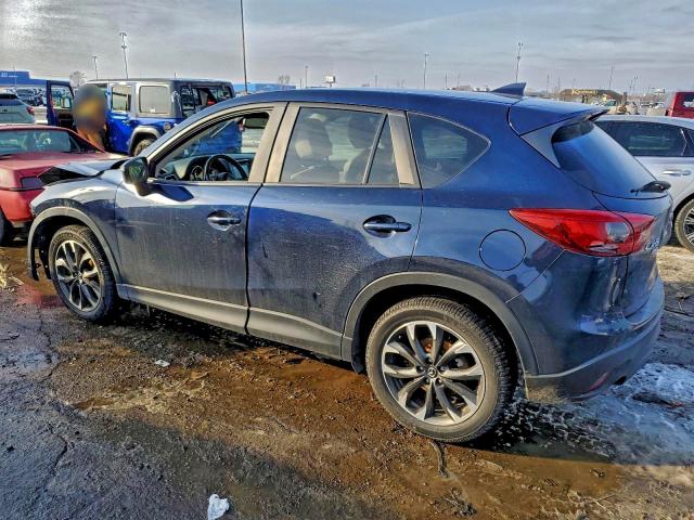 Photo 2 from auction – 2016 MAZDA CX-5 GT with VIN JM3KE4DY4G0882177