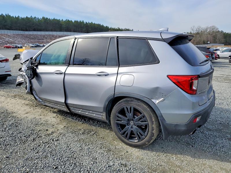 Photo 2 from auction – 2021 HONDA PASSPORT with VIN 5FNYF7H23MB003577