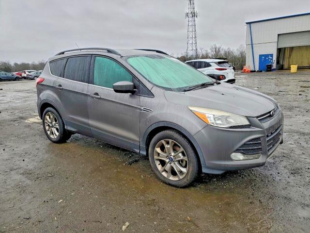 Photo 4 from auction – 2014 FORD ESCAPE with VIN 1FMCU9GXXEUD07034