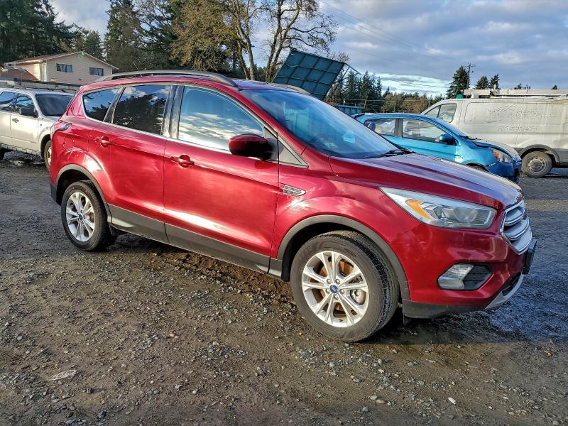 Photo 4 from auction – 2017 FORD ESCAPE SE with VIN 1FMCU9GD0HUC70067