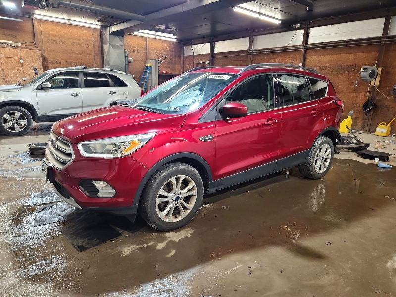 FORD ESCAPE 2018 with VIN 1FMCU9HD6JUA18764 - Photo from auction