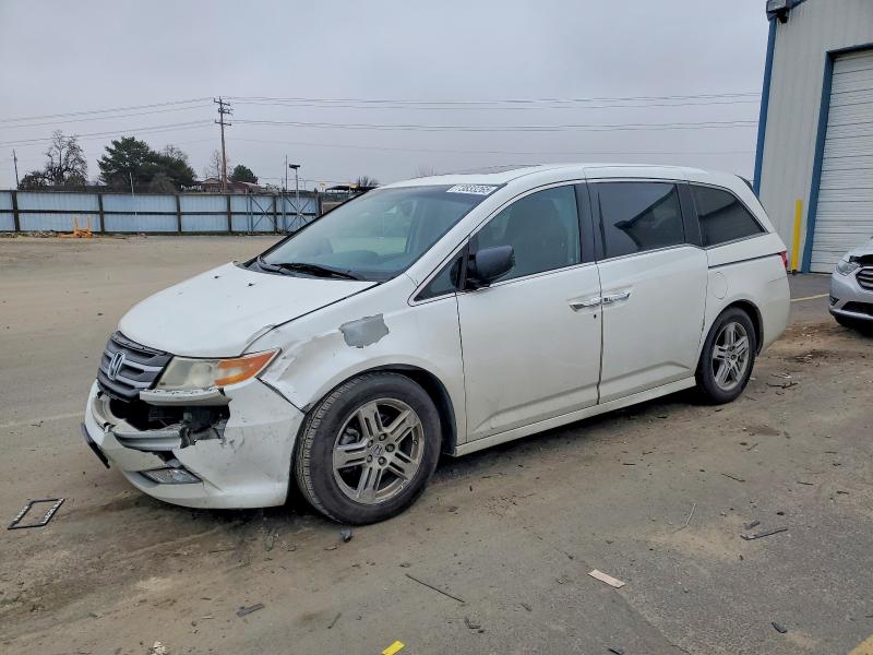 HONDA ODYSSEY TO 2012 with VIN 5FNRL5H96CB077296 - Photo from auction