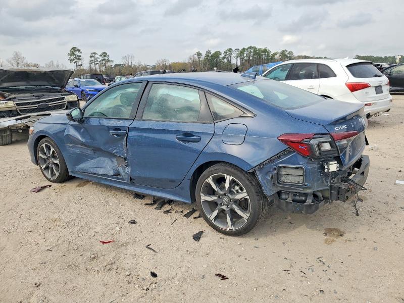 Photo 2 from auction – 2025 HONDA CIVIC SPOR with VIN 2HGFE4F85SH329132