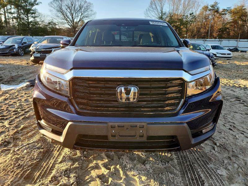Photo 5 from auction – 2023 HONDA RIDGELINE with VIN 5FPYK3F76PB043389