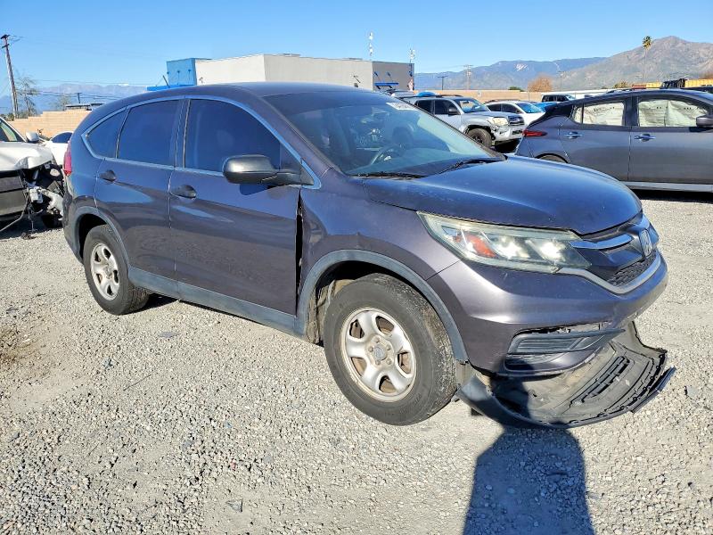 Photo 4 from auction – 2015 HONDA CR-V LX with VIN 3CZRM3H33FG717289