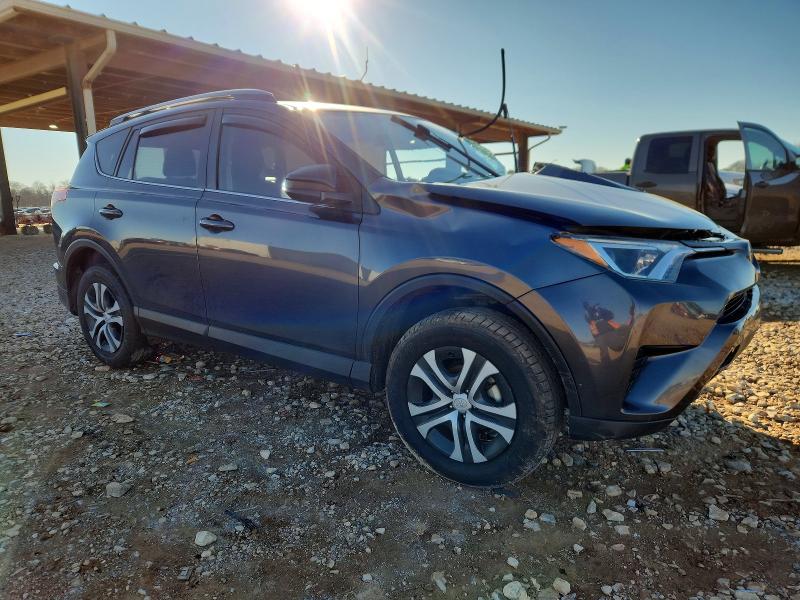 Photo 4 from auction – 2018 TOYOTA RAV4 LE with VIN JTMZFREV1JJ733832