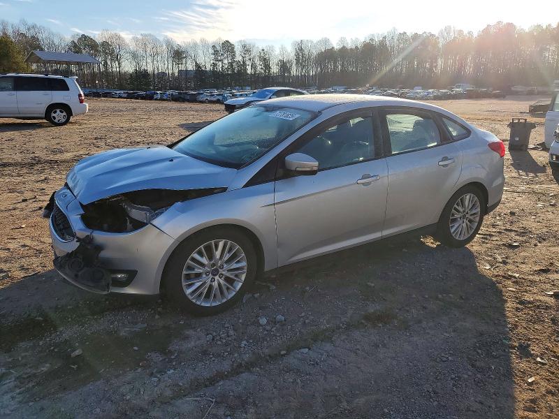 FORD FOCUS SE 2016 with VIN 1FADP3F27GL298214 - Photo from auction