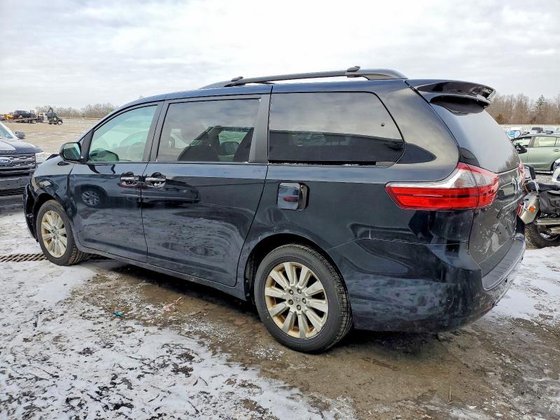 Photo 2 from auction – 2015 TOYOTA SIENNA XLE with VIN 5TDDK3DC4FS105468