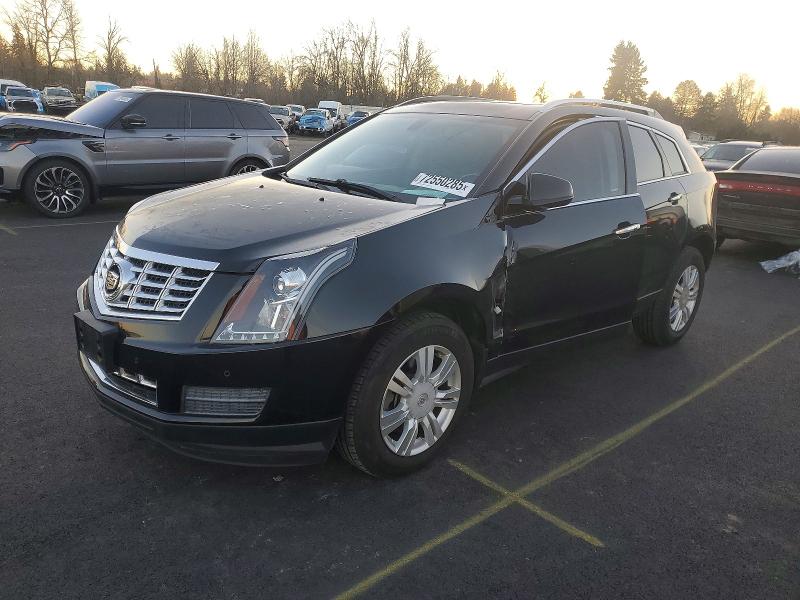 CADILLAC SRX 2015 with VIN 3GYFNBE3XFS557844 - Photo from auction