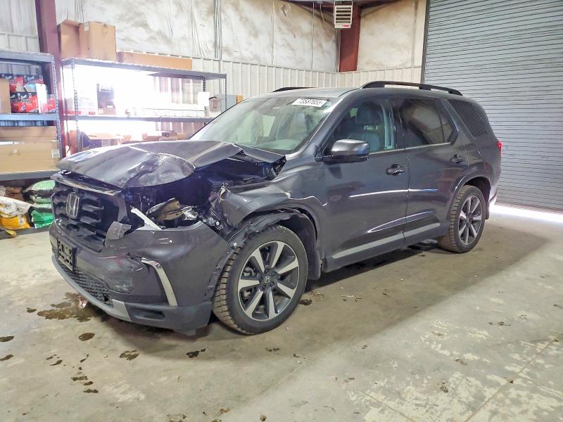HONDA PILOT ELIT 2023 with VIN 5FNYG1H81PB035267 - Photo from auction