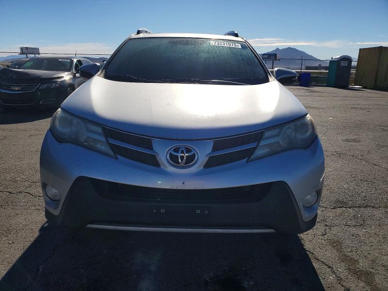 Photo 5 from auction – 2015 TOYOTA RAV4 LIMIT with VIN JTMDFREV6FD159292