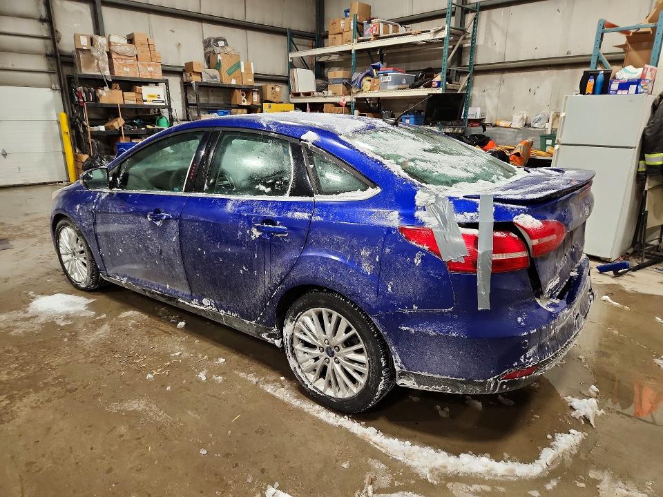 Photo 2 from auction – 2015 FORD FOCUS with VIN 1FADP3J29FL371685