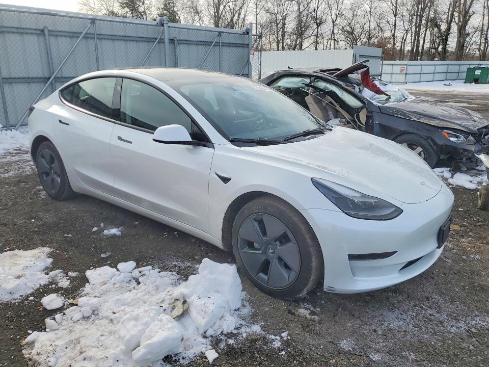 Photo 4 from auction – 2023 TESLA MODEL 3 with VIN 5YJ3E1EAXPF599037