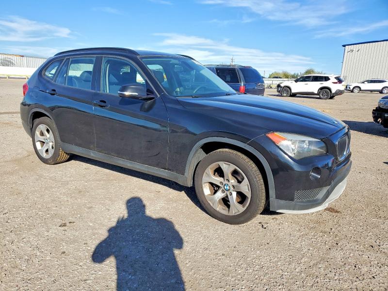 Photo 4 from auction – 2015 BMW X1 SDRIVE2 with VIN WBAVM1C53FV317769