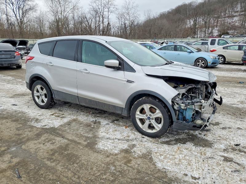Photo 4 from auction – 2016 FORD ESCAPE with VIN 1FMCU9GX1GUB68611