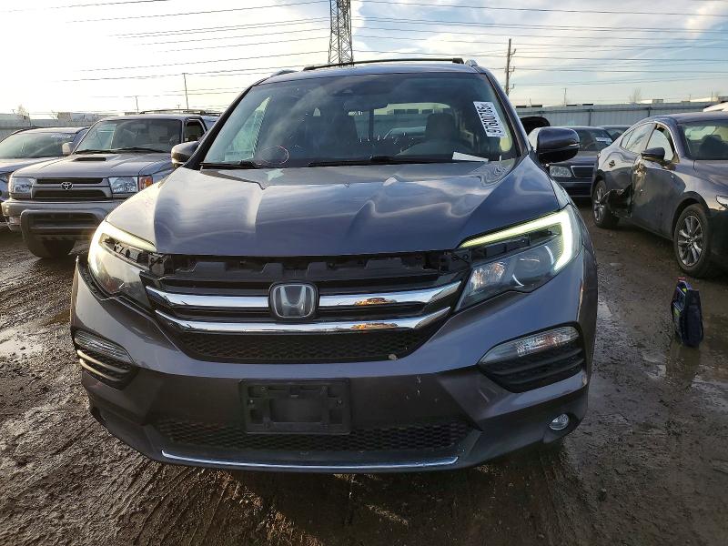 Photo 5 from auction – 2016 HONDA PILOT with VIN 5FNYF6H04GB057001