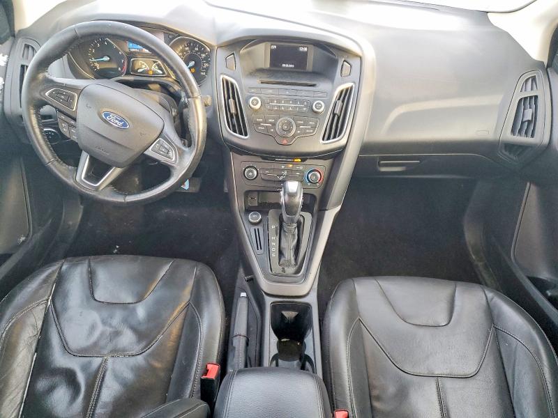 Photo 8 from auction – 2016 FORD FOCUS SE with VIN 1FADP3F24GL214267