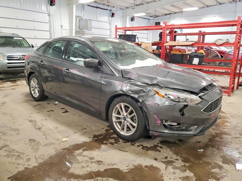 Photo 4 from auction – 2018 FORD FOCUS SE with VIN 1FADP3F24JL328602