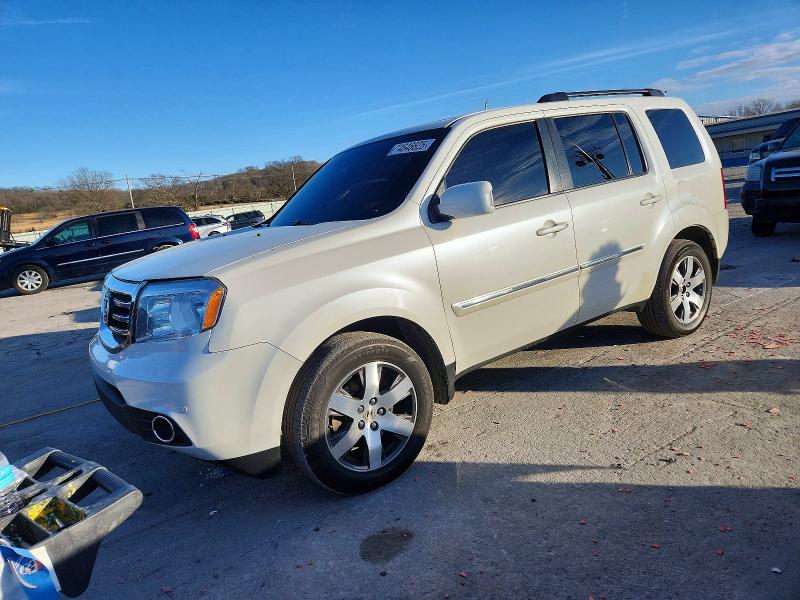 HONDA PILOT TOUR 2014 con VIN 5FNYF4H97EB010271 - Foto de la subasta