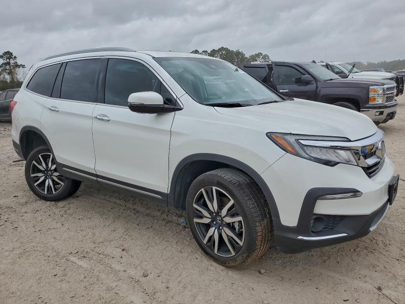 Photo 4 from auction – 2021 HONDA PILOT TOUR with VIN 5FNYF5H63MB035808