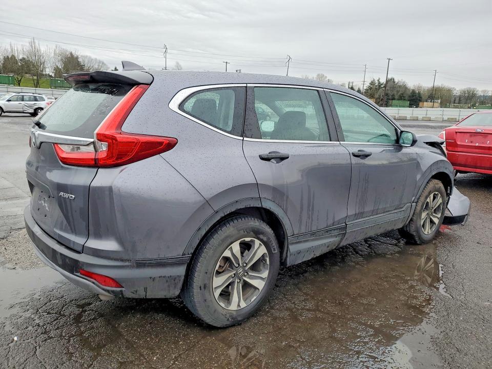 Photo 3 from auction – 2019 HONDA CR-V LX with VIN 5J6RW6H36KL001074