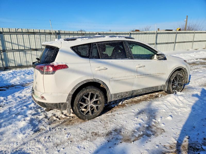 Photo 3 from auction – 2016 TOYOTA RAV4 SE with VIN JTMJFREV4GJ075218