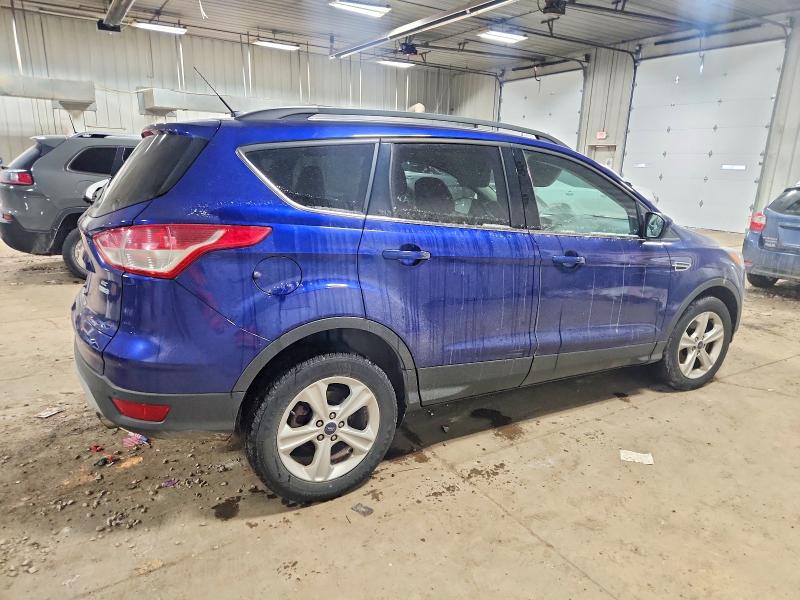 Photo 3 from auction – 2016 FORD ESCAPE SE with VIN 1FMCU9GX6GUC41004