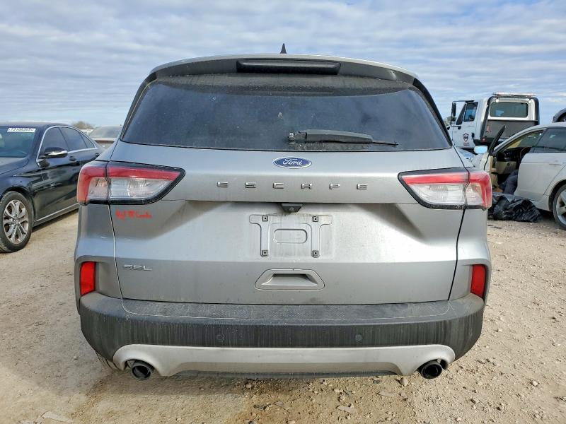 Photo 6 from auction – 2021 FORD ESCAPE with VIN 1FMCU0H63MUA36656
