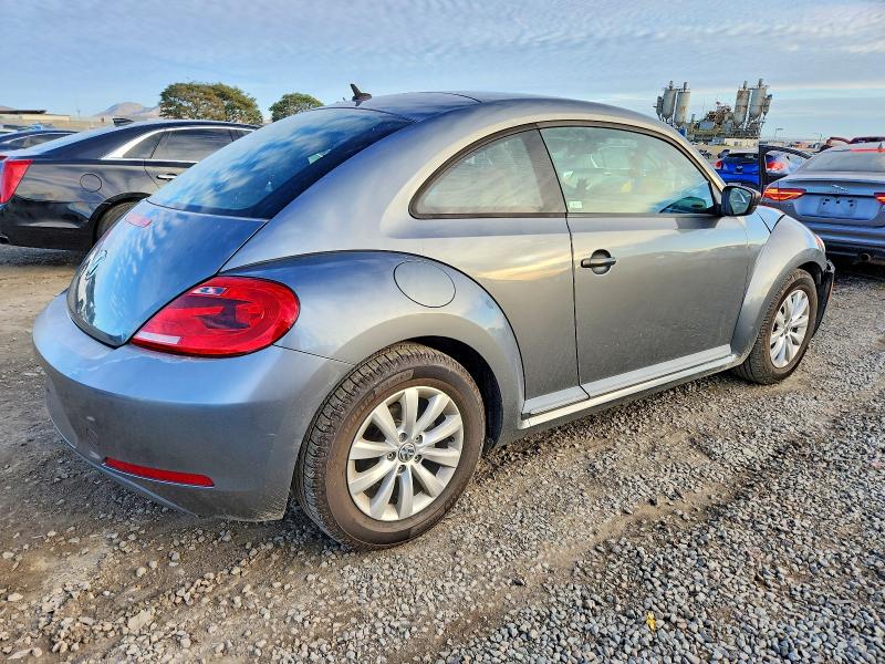 Photo 3 from auction – 2013 VOLKSWAGEN BEETLE with VIN 3VWFP7AT1DM666968