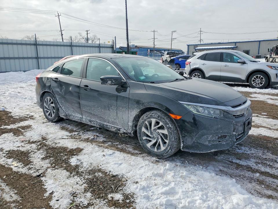 Photo 4 from auction – 2018 HONDA CIVIC EX with VIN 19XFC2F72JE038890