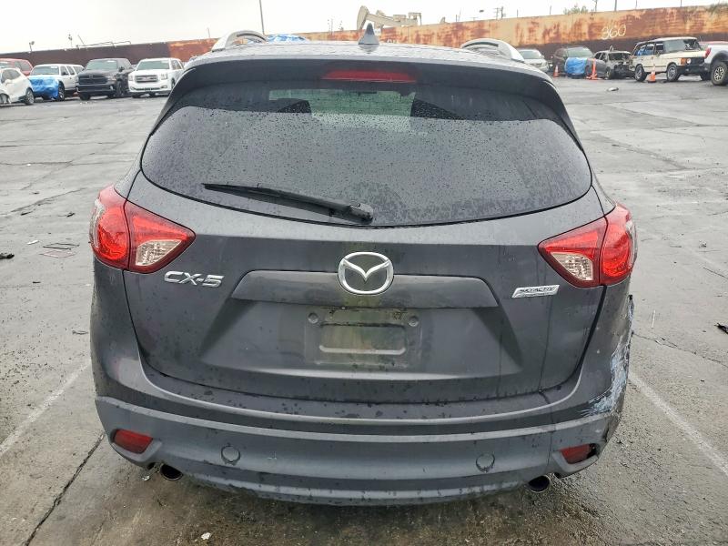 Photo 6 from auction – 2014 MAZDA CX-5 with VIN JM3KE2CY3E0328048