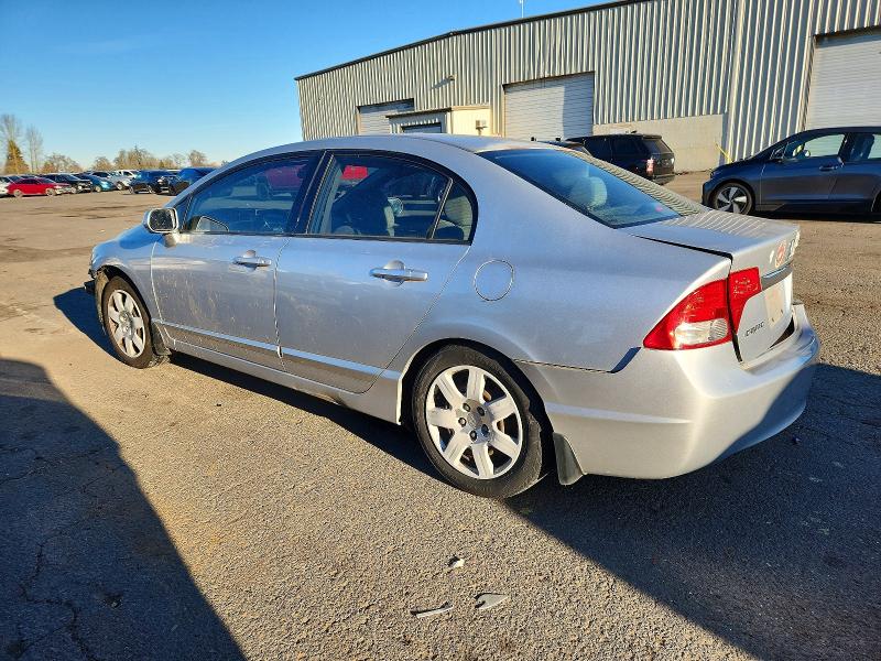 Photo 2 from auction – 2011 HONDA CIVIC LX with VIN 2HGFA1F59BH304069