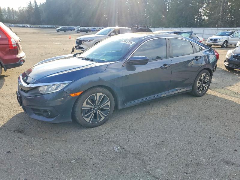 Photo 1 from auction – 2017 HONDA CIVIC EX with VIN 19XFC1F30HE205040
