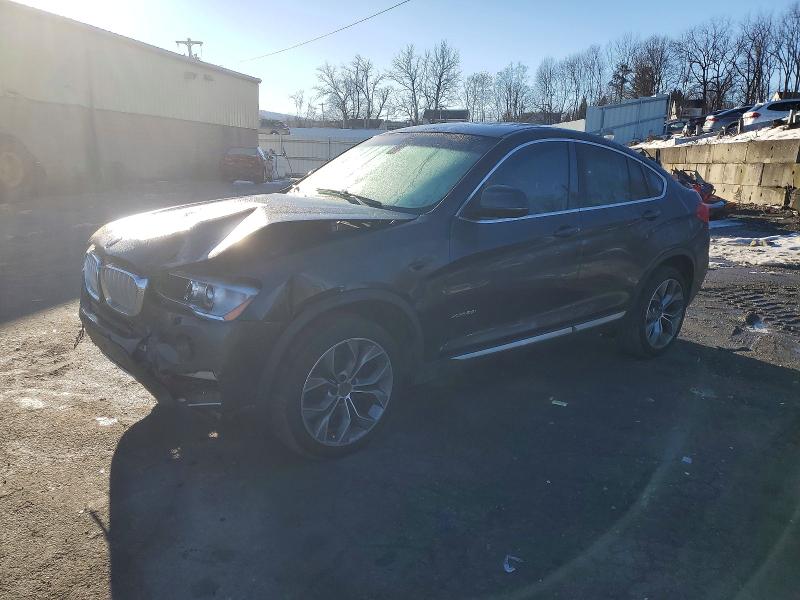 BMW X4 2015 with VIN 5UXXW3C55F0M87077 - Photo from auction
