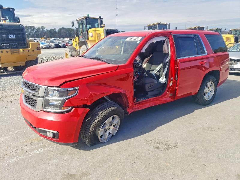 CHEVROLET TAHOE POLI 2019 with VIN 1GNSKDKC7KR193237 - Photo from auction