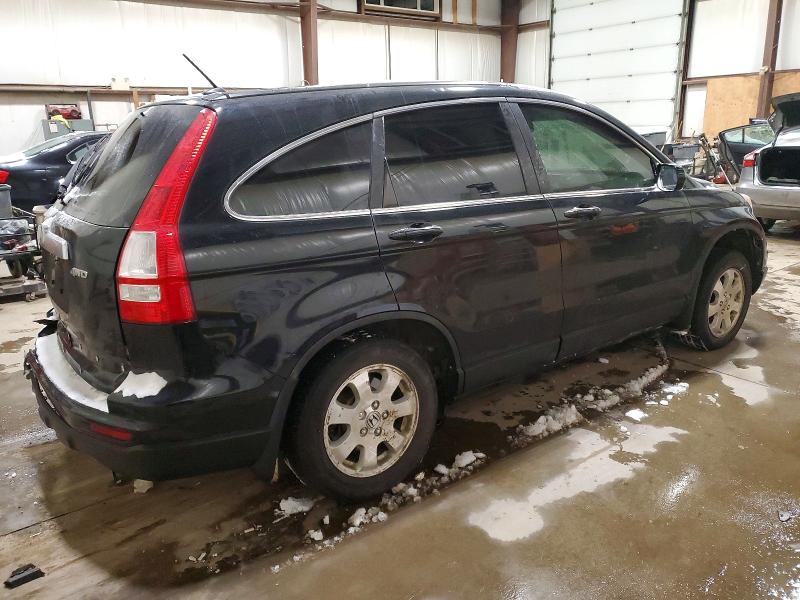 Photo 3 from auction – 2011 HONDA CR-V EXL with VIN 5J6RE4H77BL824932