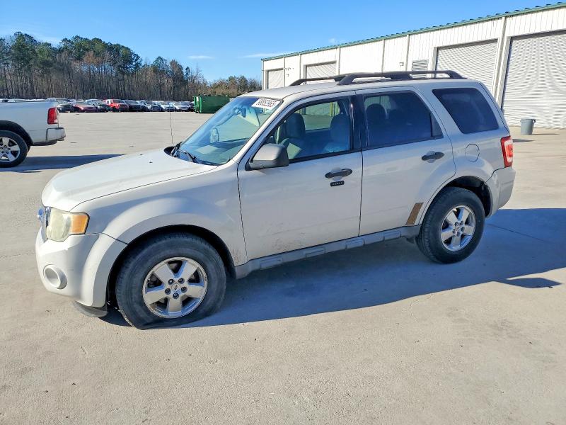 FORD ESCAPE 2010 with VIN 1FMCU0D73AKA33312 - Photo from auction
