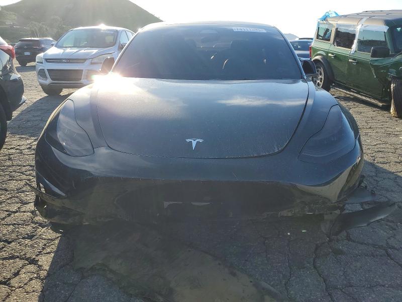 Photo 5 from auction – 2022 TESLA MODEL 3 with VIN 5YJ3E1EA0NF299228