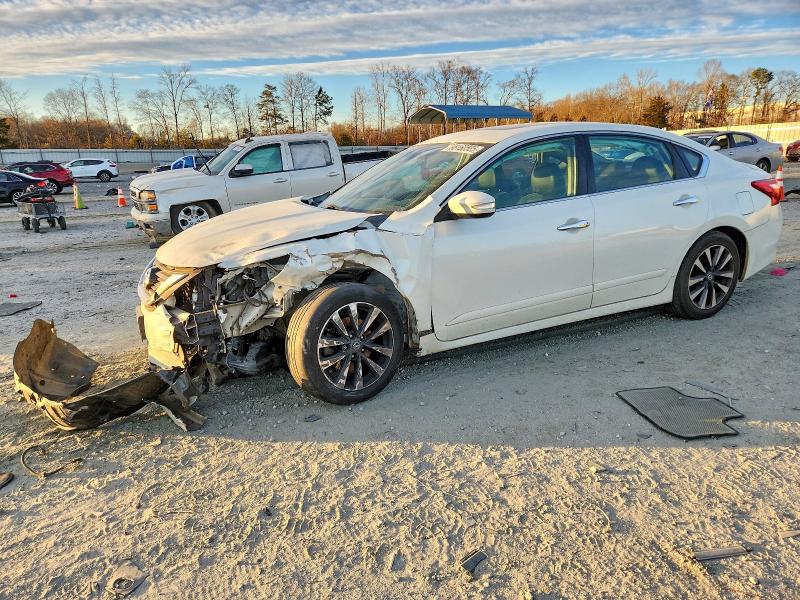 NISSAN ALTIMA 2017 with VIN 1N4AL3AP0HC127663 - Photo from auction