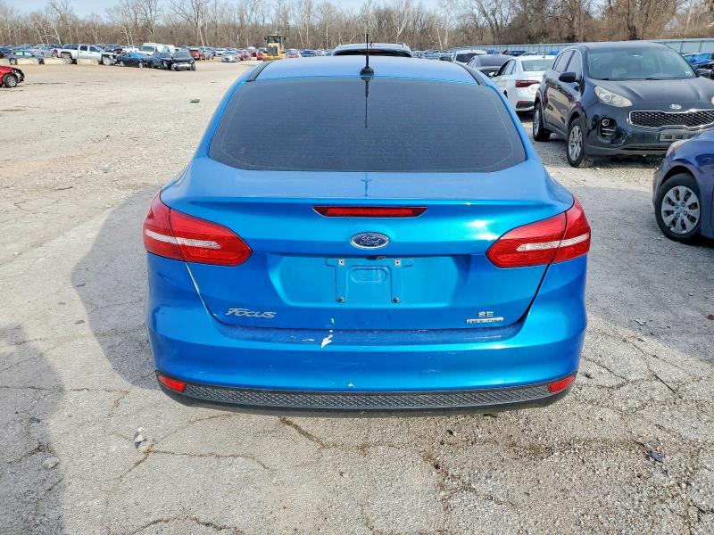 Photo 6 from auction – 2016 FORD FOCUS SE with VIN 1FADP3F25GL272453