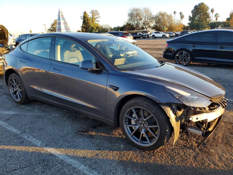 Photo 4 from auction – 2023 TESLA MODEL 3 with VIN 5YJ3E1EA3PF675021