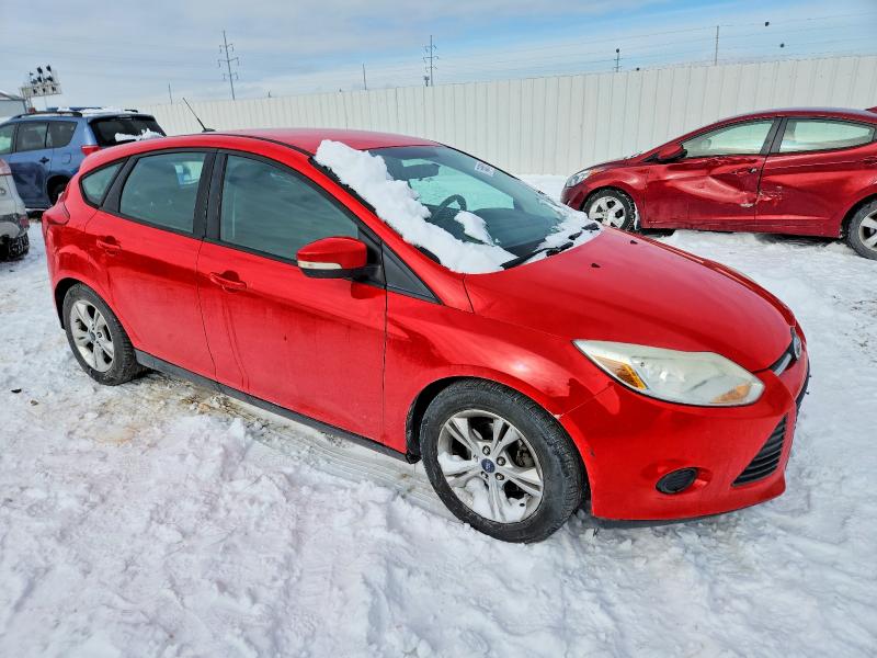 Foto 4 de la subasta – 2014 FORD FOCUS SE con VIN 1FADP3K23EL312693