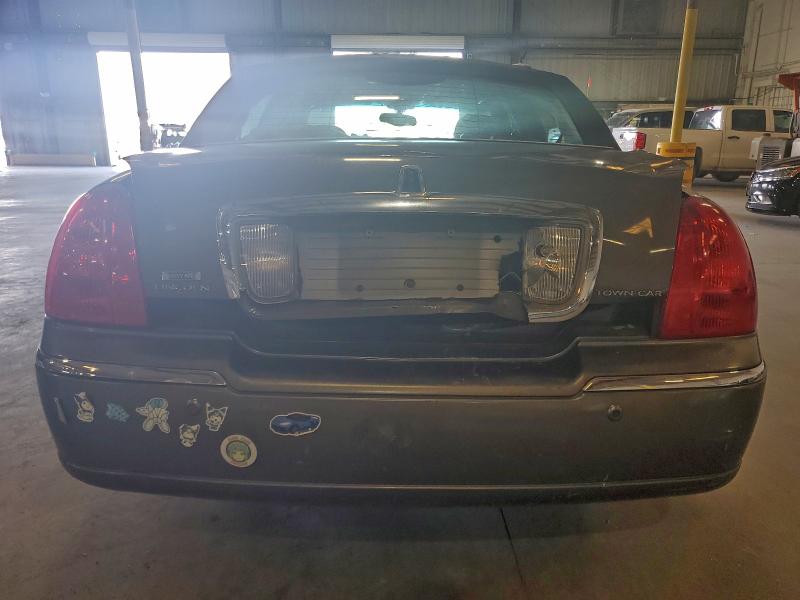 Photo 6 from auction – 2004 LINCOLN TOWN CAR E with VIN 1LNHM81W74Y629492