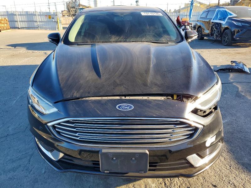 Photo 5 from auction – 2018 FORD FUSION with VIN 3FA6P0PU4JR204368