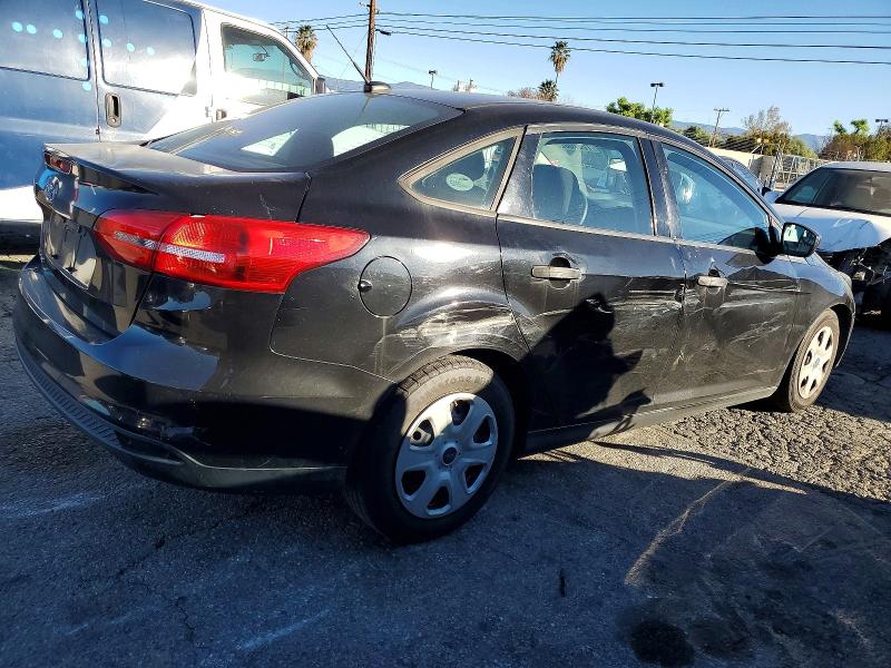Photo 3 from auction – 2016 FORD FOCUS S with VIN 1FADP3E21GL268143